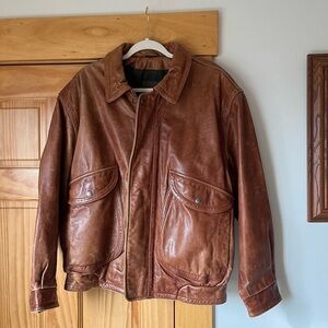 Brown Robert Comstock, brown leather coat